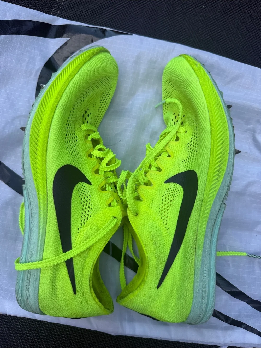 Nike Bright spikes, come with shoes bag